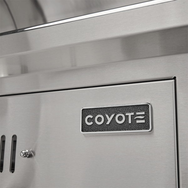 Coyote Outdoor Living 36 Inch Stainless Steel Charcoal Grill Logo