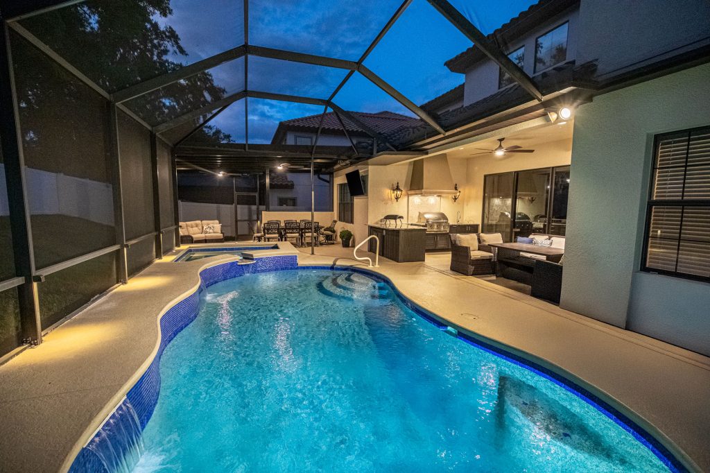 Custom Outdoor Living Space With Outdoor Kitchen and Screened In Shaded Pergola Installed Near Me Tampa Florida Just Grillin Outdoor Living WEB