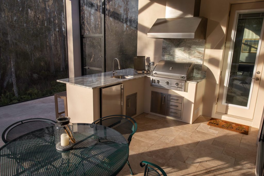 Custom Outdoor Kitchen With Patio Lighting In Lutz