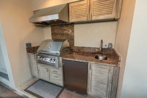 Custom Outdoor Kitchen With Grill Vent Hood and Sink Tampa Florida WEB