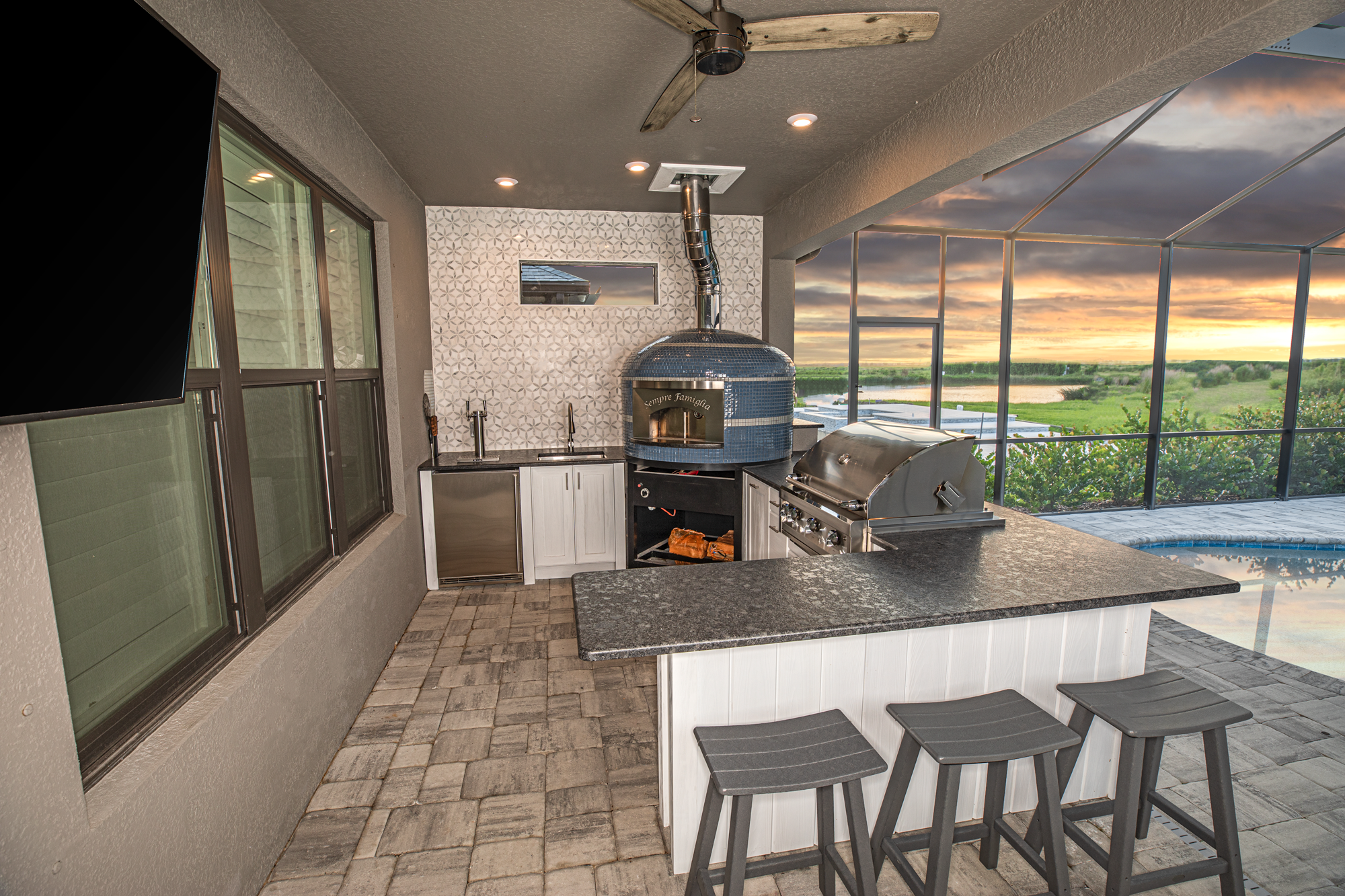 Custom Outdoor Kitchen With Pizza Oven and Tile Wall Sarasota Florida WEB