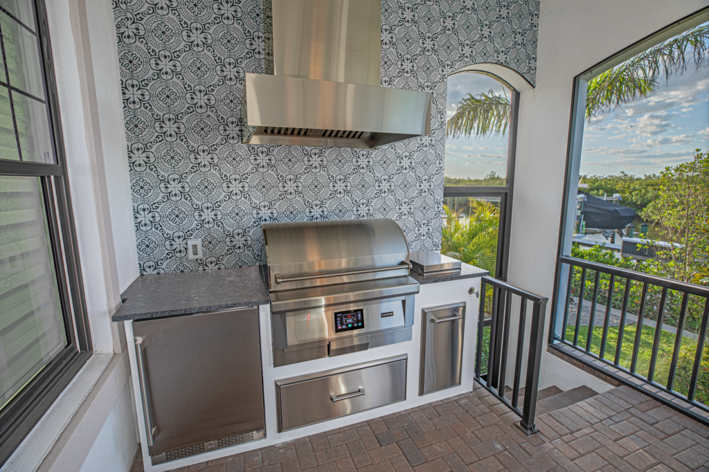Custom Outdoor Kitchen With Vent Hood and Tile Wall Tampa Florida WEB