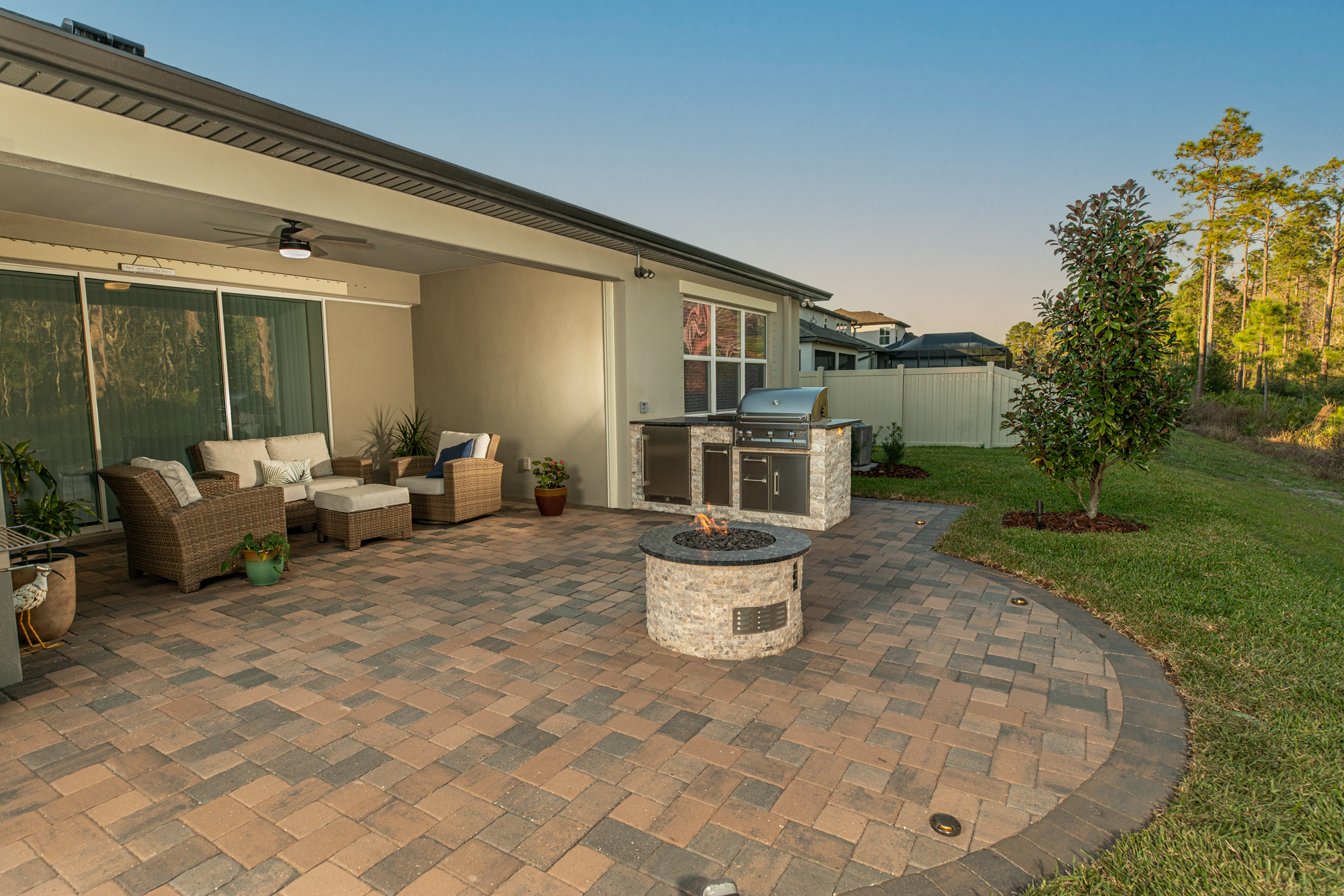 Hardscape Patio With Outdoor Kitchen Fire Pit and Lighting Tampa Florida WEB