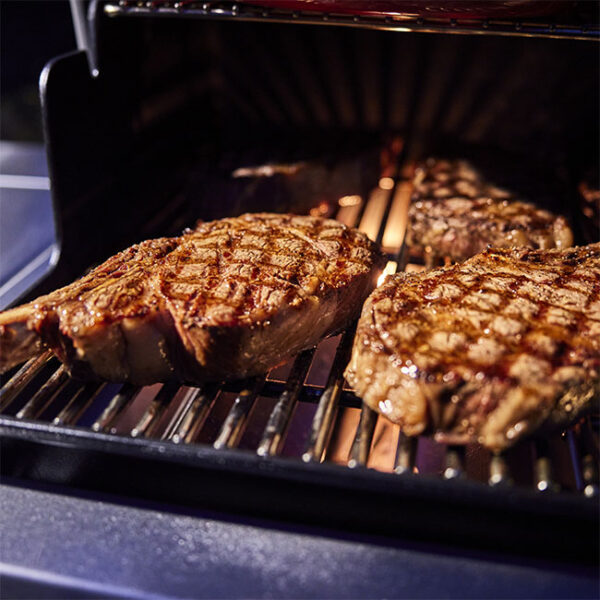 Weber Summit Cooking Steaks on Stainless Grates