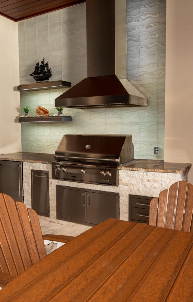 Custom Outdoor Kitchen With Alfresco Grill Falmec Vent Hood and Wall Shelves Anna Maria Island Florida WEB