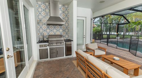 Custom Outdoor Kitchen With Gas Grill, Tile Wall and Vent Hood in Tampa Florida WEB